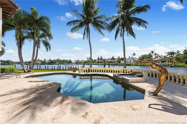 a view of a lake with a house