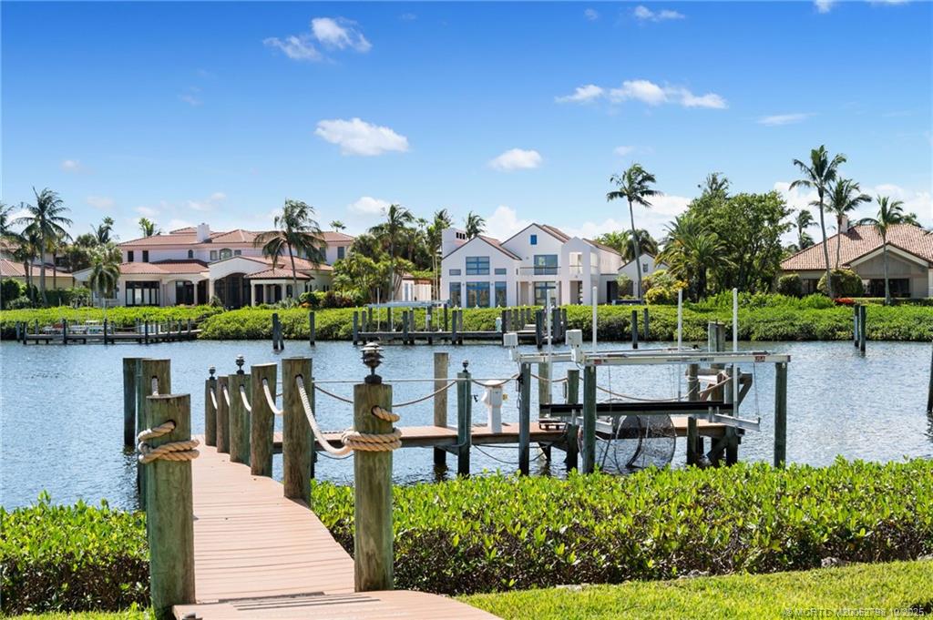 2440 Bahia Way Stuart, FL 34996 - Photo 34 of 67 a house view with a lake view