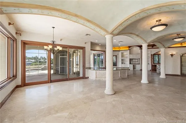 a view of wooden deck with a lake view