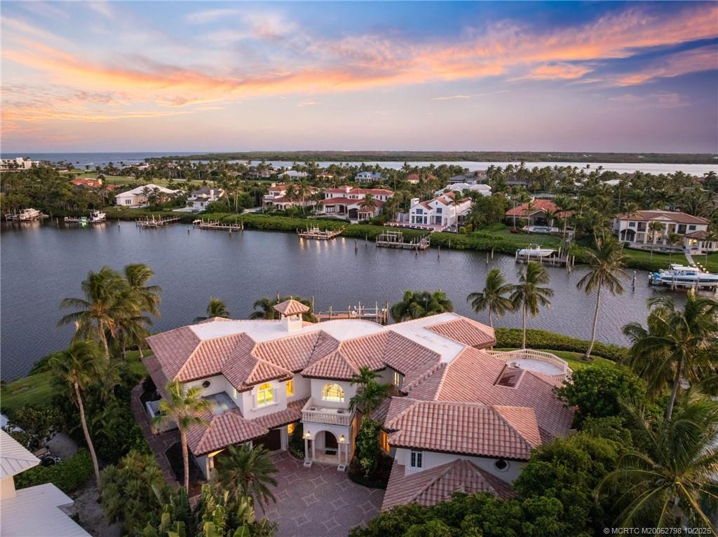2440 Bahia Way Stuart, FL 34996 - Photo 4 of 67 an aerial view of lake and city