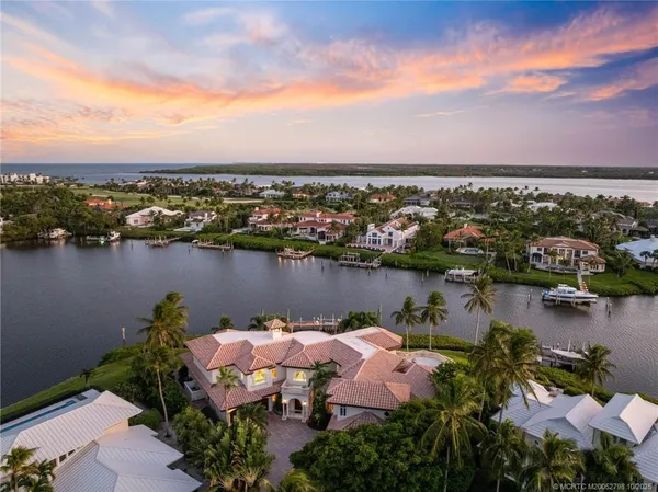 an aerial view of lake and city