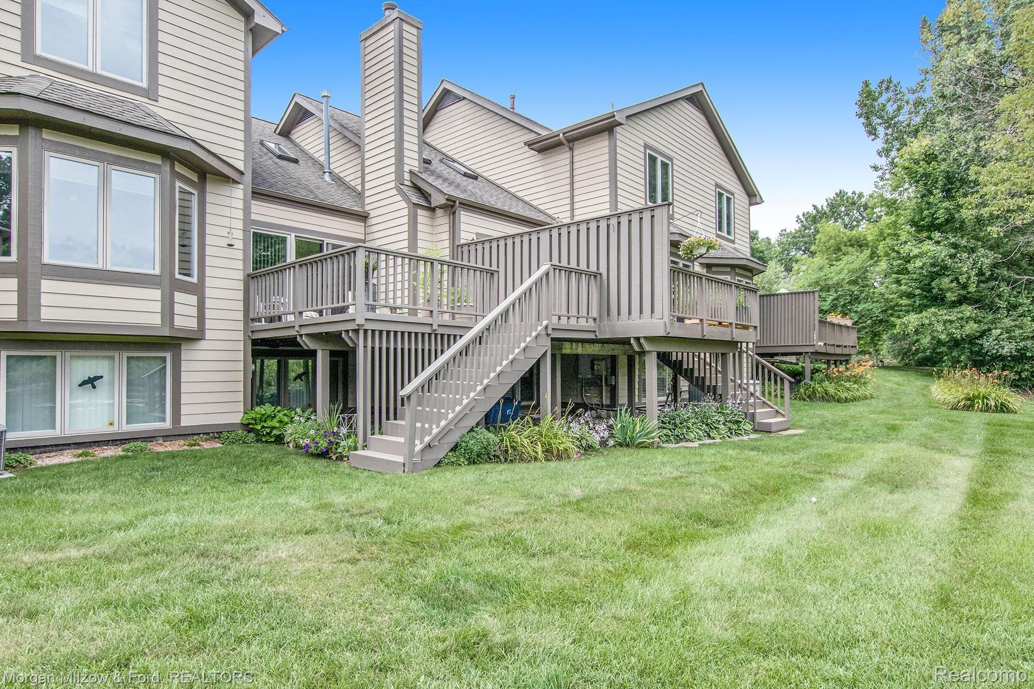 6582 Steeple Ridge Clarkston, MI 48346 - Photo 21 of 23 Backyard/deck