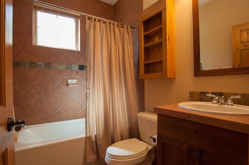 188 Tip Top Trail, Unit 6559 Keystone, CO 80435 - Photo 11 of 24 a bathroom with a sink a toilet and shower