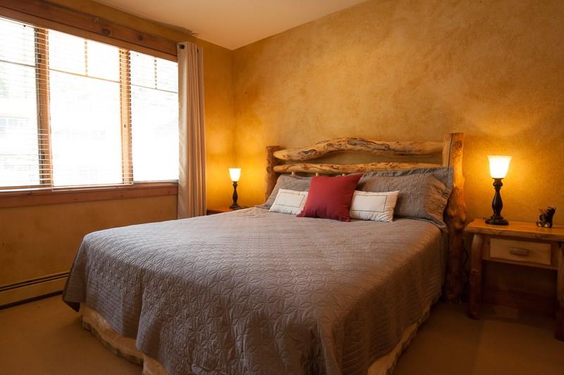 188 Tip Top Trail, Unit 6559 Keystone, CO 80435 - Photo 12 of 24 a bedroom with a bed and window