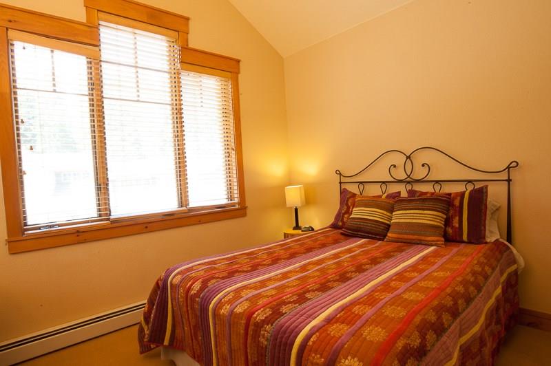 188 Tip Top Trail, Unit 6559 Keystone, CO 80435 - Photo 15 of 24 a bedroom with a bed and a window