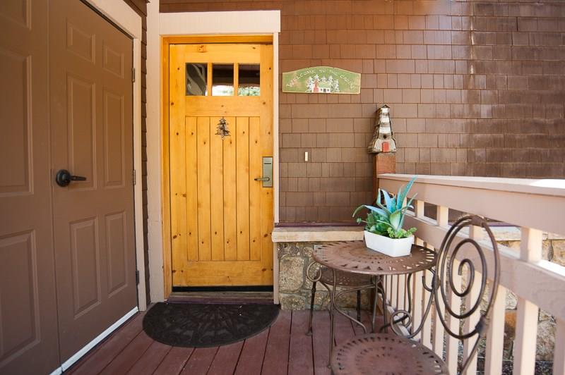188 Tip Top Trail, Unit 6559 Keystone, CO 80435 - Photo 23 of 24 a view of a door and chair in the patio
