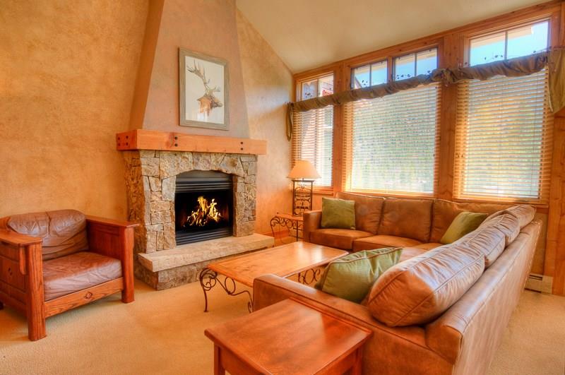 188 Tip Top Trail, Unit 6559 Keystone, CO 80435 - Photo 4 of 24 a living room with furniture and a fireplace