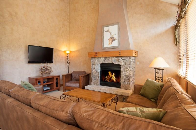 188 Tip Top Trail, Unit 6559 Keystone, CO 80435 - Photo 6 of 24 a living room with furniture and a fireplace