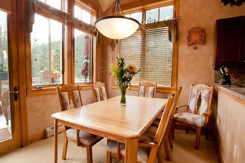 188 Tip Top Trail, Unit 6559 Keystone, CO 80435 - Photo 7 of 24 a view of a dining room with furniture and a potted plant