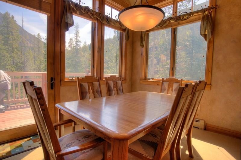 188 Tip Top Trail, Unit 6559 Keystone, CO 80435 - Photo 8 of 24 a view of a dining room with furniture window and wooden floor