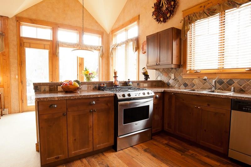188 Tip Top Trail, Unit 6559 Keystone, CO 80435 - Photo 9 of 24 a kitchen with a sink stove and cabinets