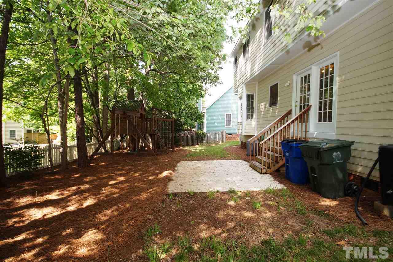 12317 Hartwick Court Raleigh, NC 27613 - Photo 19 of 24 a view of a house with backyard and sitting area
