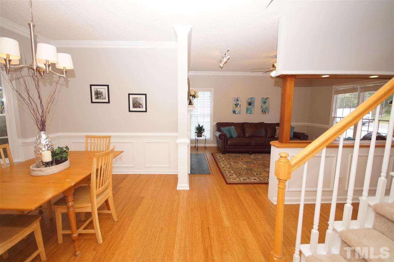 12317 Hartwick Court Raleigh, NC 27613 - Photo 5 of 24 a living room with furniture and wooden floor