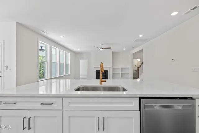 a bathroom with a sink double vanity and a mirror
