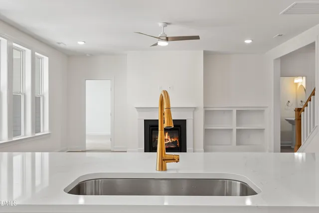 a bathroom with a sink double vanity and a mirror
