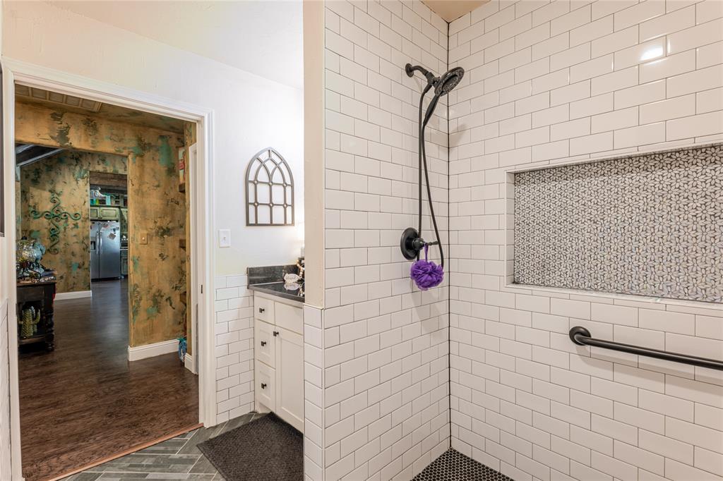 470 Wilson Bend Road Millsap, TX 76066 - Photo 26 of 39 a bathroom with a shower