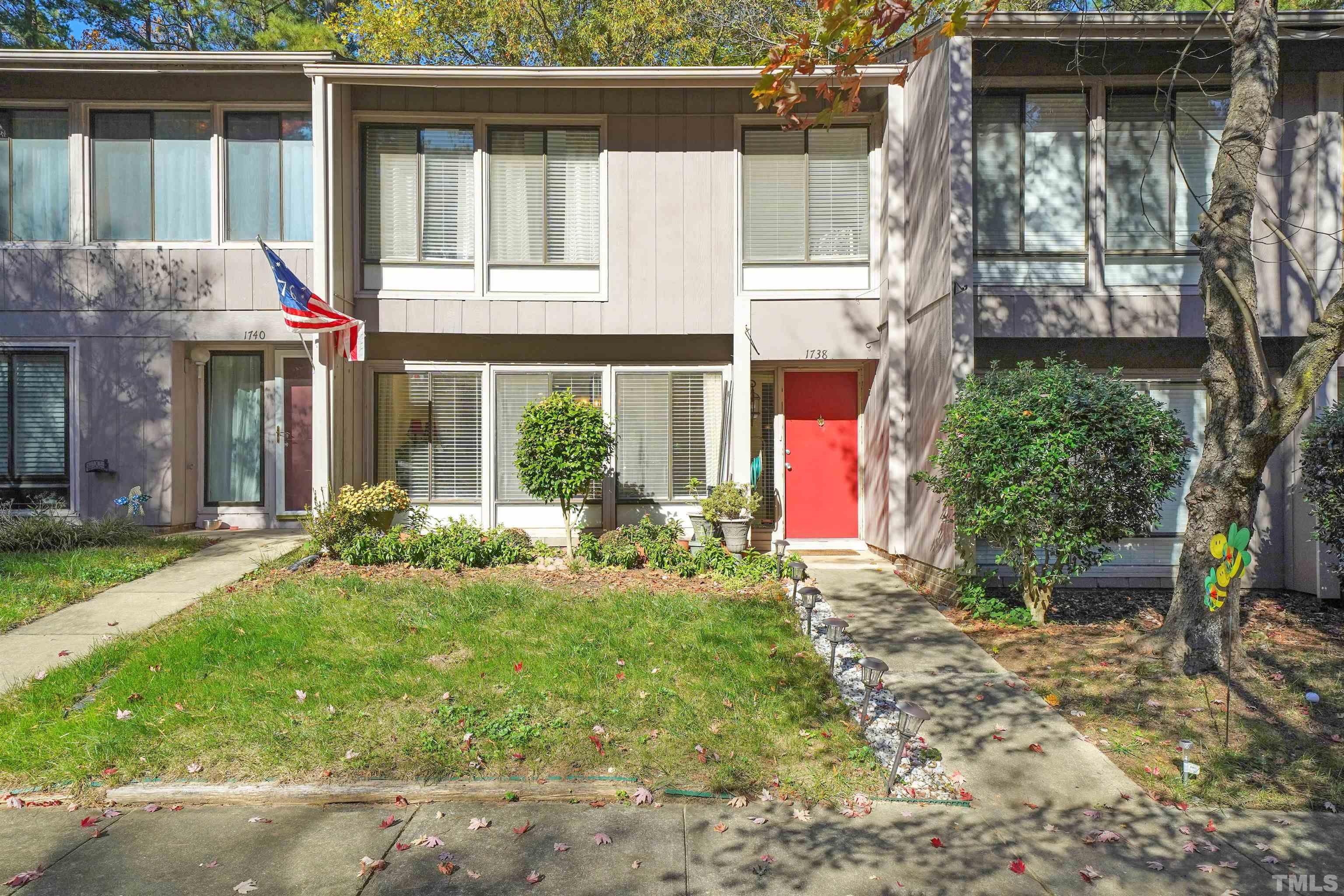 a house view with a garden space
