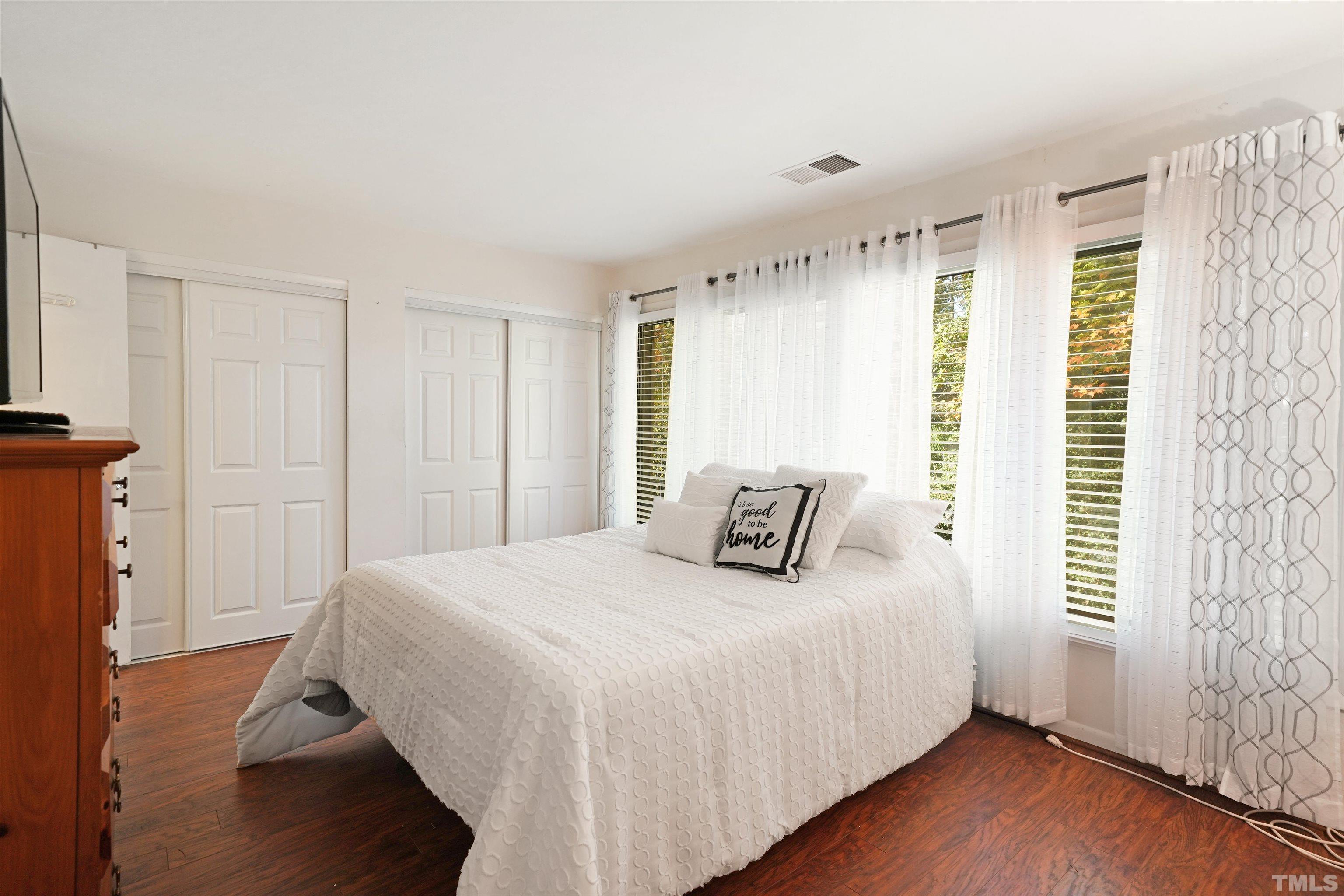 1738 Quail Ridge Road Raleigh, NC 27609 - Photo 11 of 13 a bedroom with a bed and a window