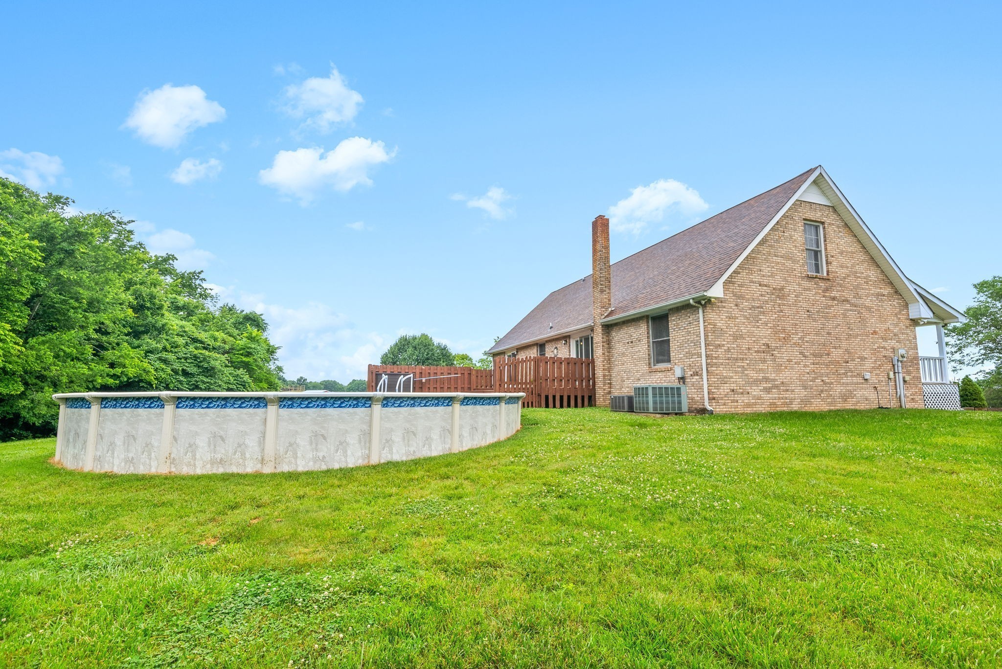 2430 Underwood Road Cunningham, TN 37052 - Photo 45 of 49 a view of a house with a backyard