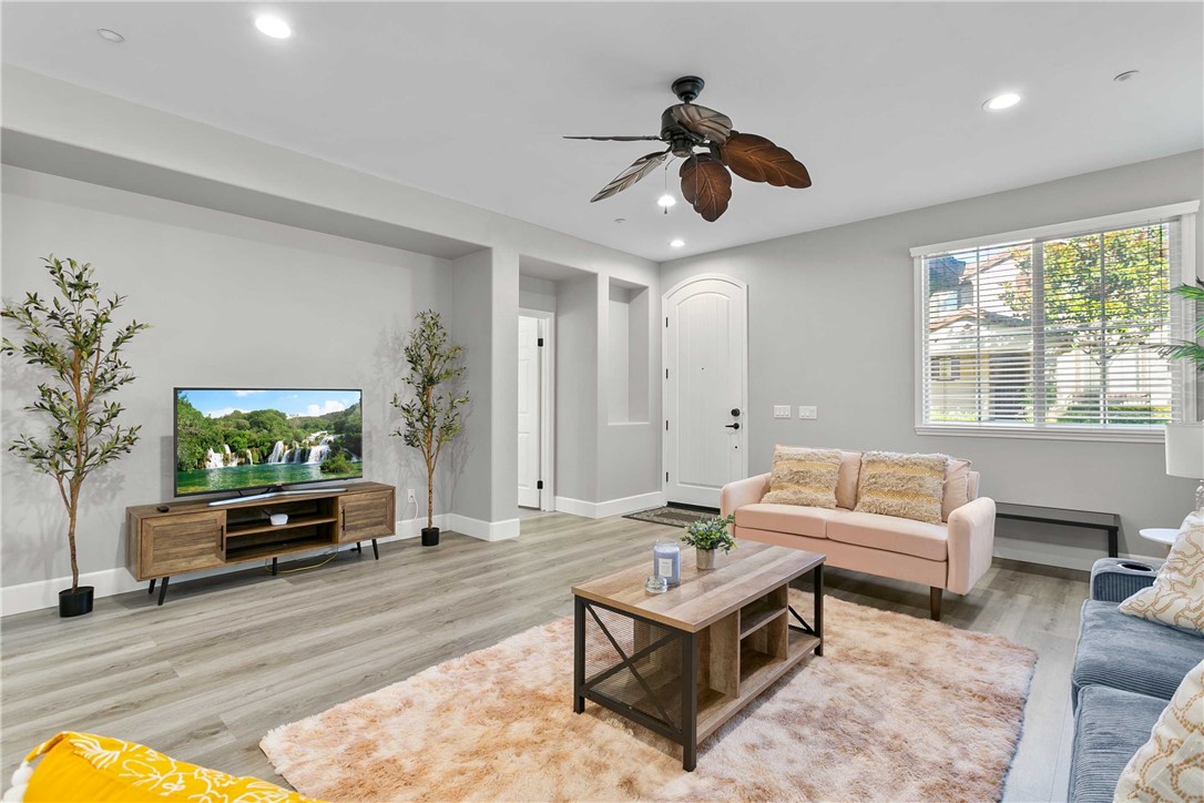1746 Agrigento Avenue Riverside, CA 92507 - Photo 3 of 22 a living room with furniture and a large window