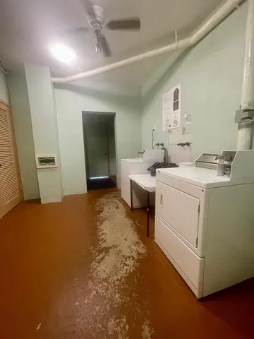 a front view of a house with parking space