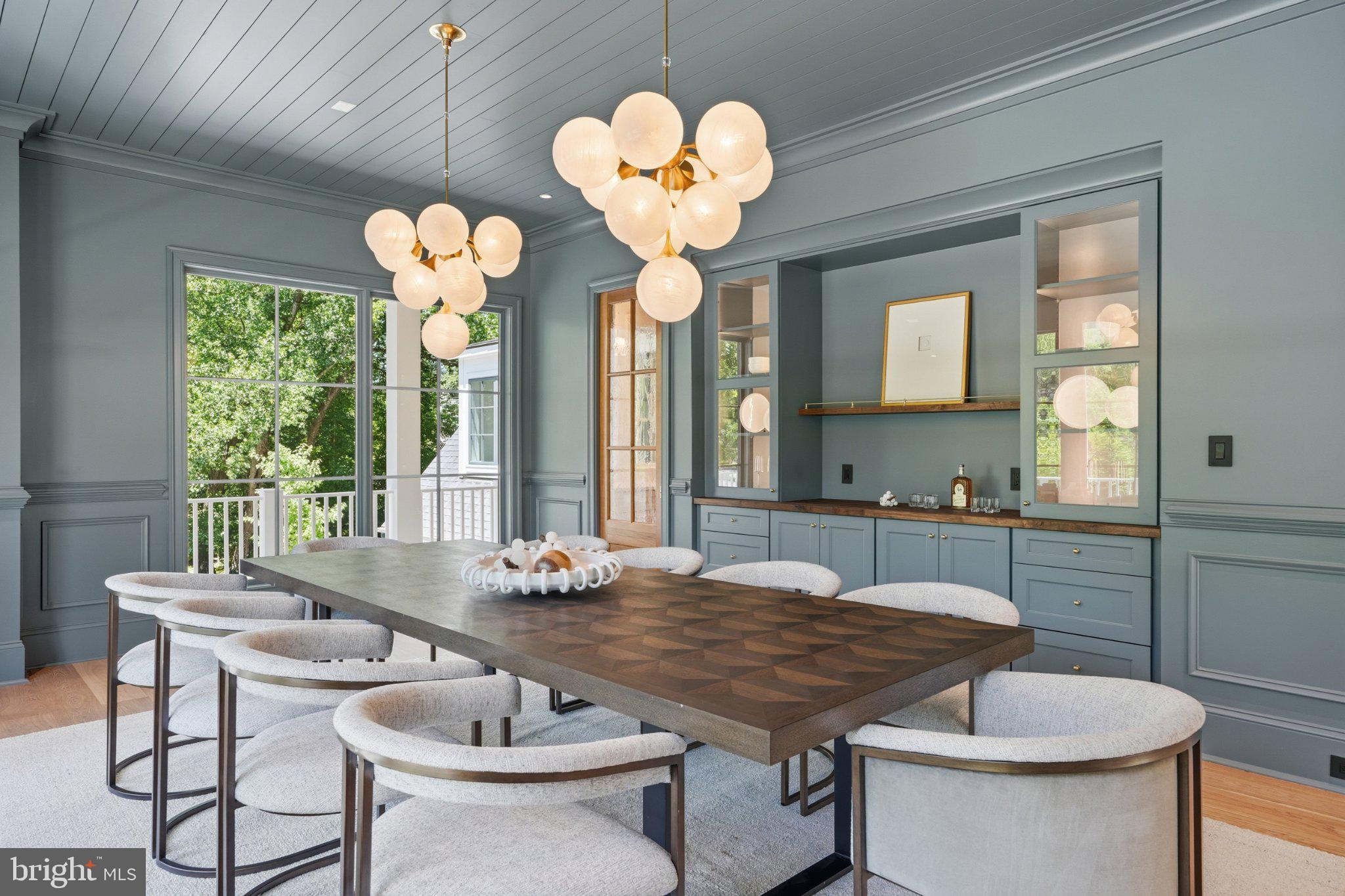 6008 Oakdale Road McLean, VA 22101 - Photo 5 of 111 Elegant dining space with modern flair.