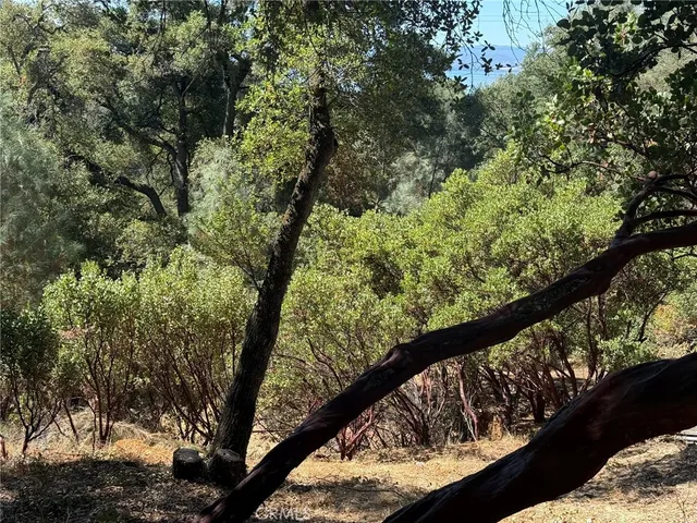a view of swimming pool from a balcony