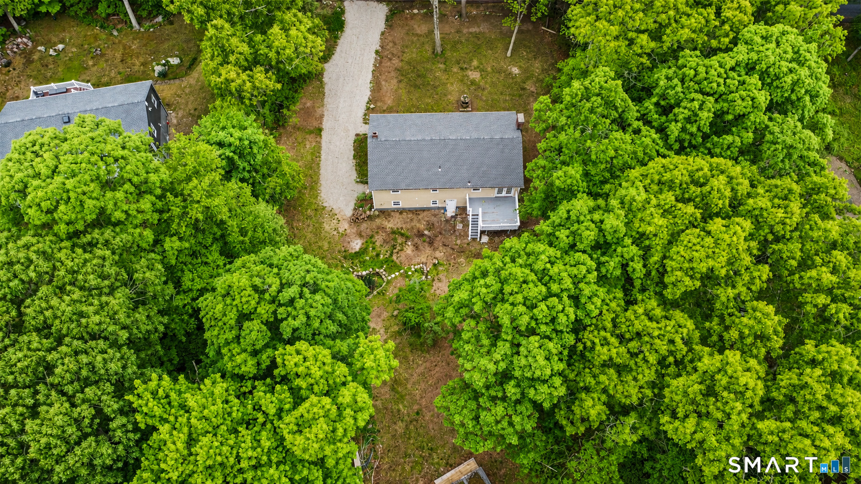 20 Quiet Woods Road East Hampton, CT 06424 - Photo 37 of 40 an aerial view of a house with a yard