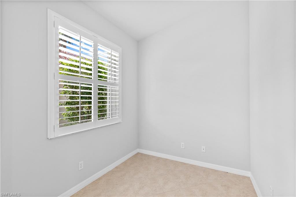 9300 Springview Loop Estero, FL 33928 - Photo 14 of 50 a view of an empty room with a window