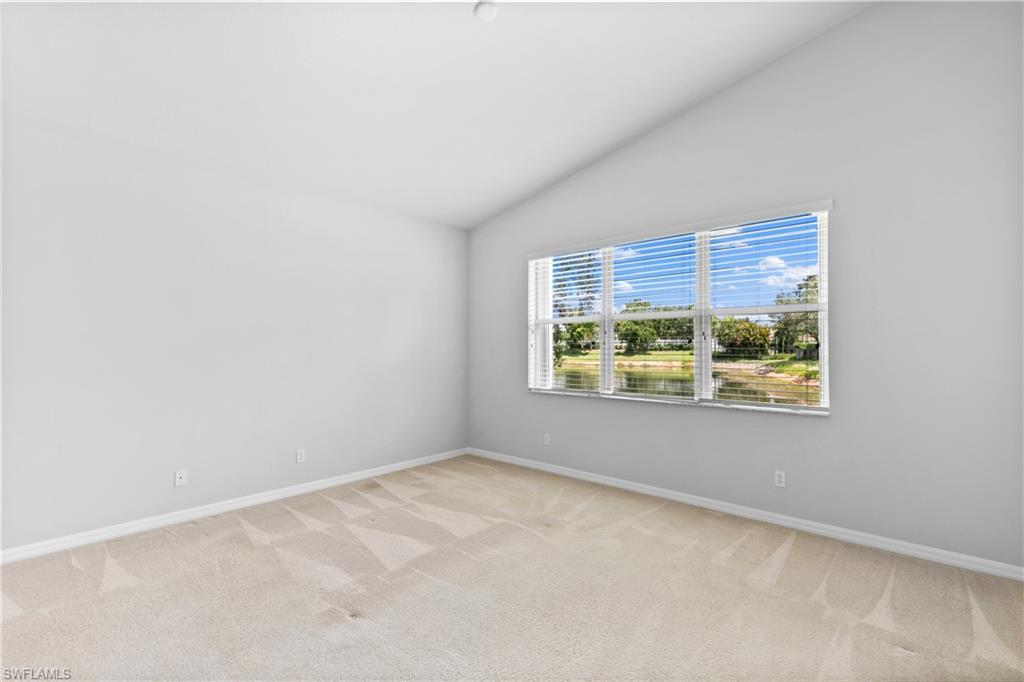 9300 Springview Loop Estero, FL 33928 - Photo 15 of 50 an empty room with a window