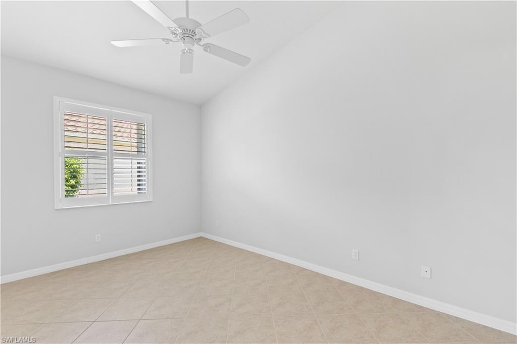 9300 Springview Loop Estero, FL 33928 - Photo 21 of 50 an empty room with a window and a fan