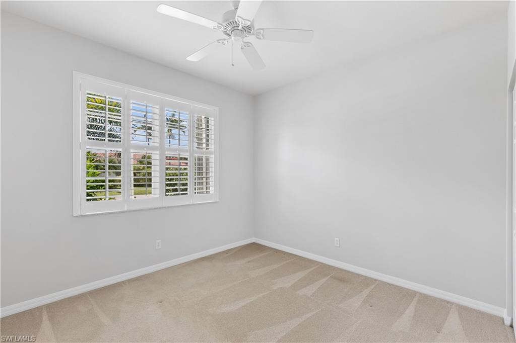9300 Springview Loop Estero, FL 33928 - Photo 23 of 50 an empty room with a window