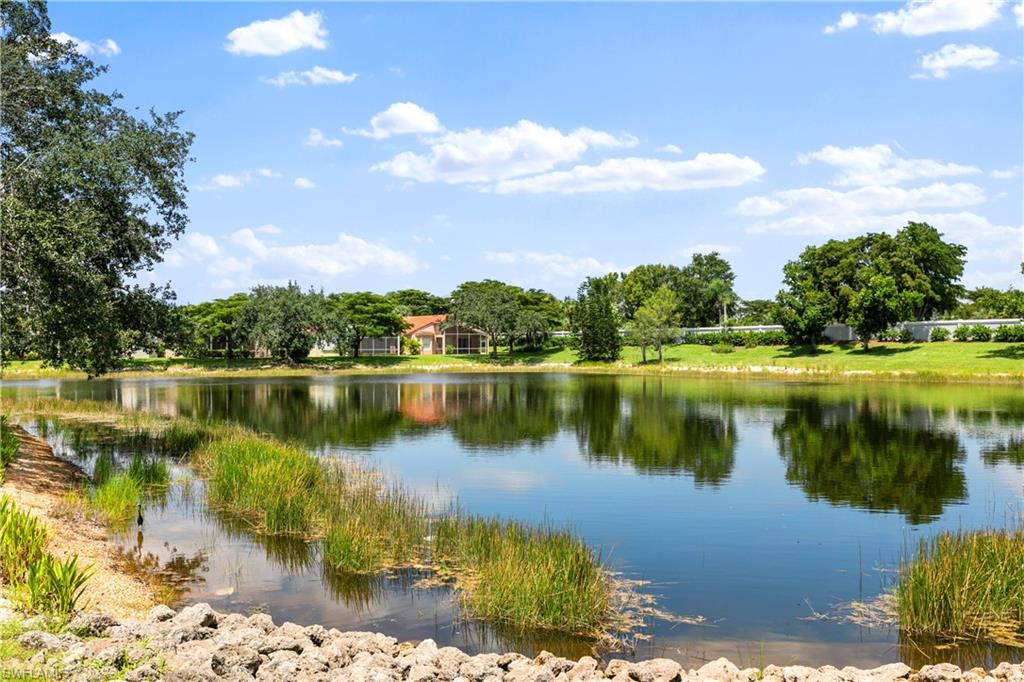 9300 Springview Loop Estero, FL 33928 - Photo 29 of 50 a lake view with a lake view