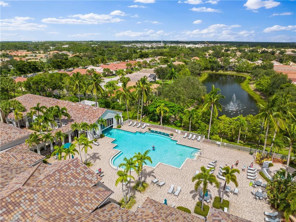 9300 Springview Loop Estero, FL 33928 - Photo 35 of 50 a view of a yard with plants and large trees