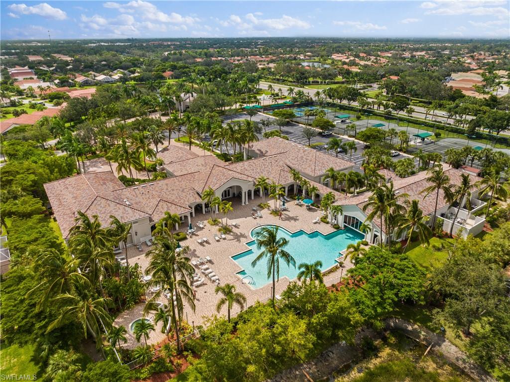 9300 Springview Loop Estero, FL 33928 - Photo 36 of 50 an aerial view of residential houses with outdoor space and trees