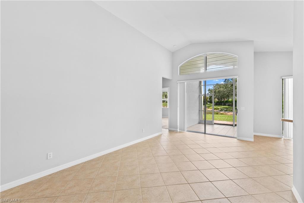9300 Springview Loop Estero, FL 33928 - Photo 7 of 50 an empty room with windows