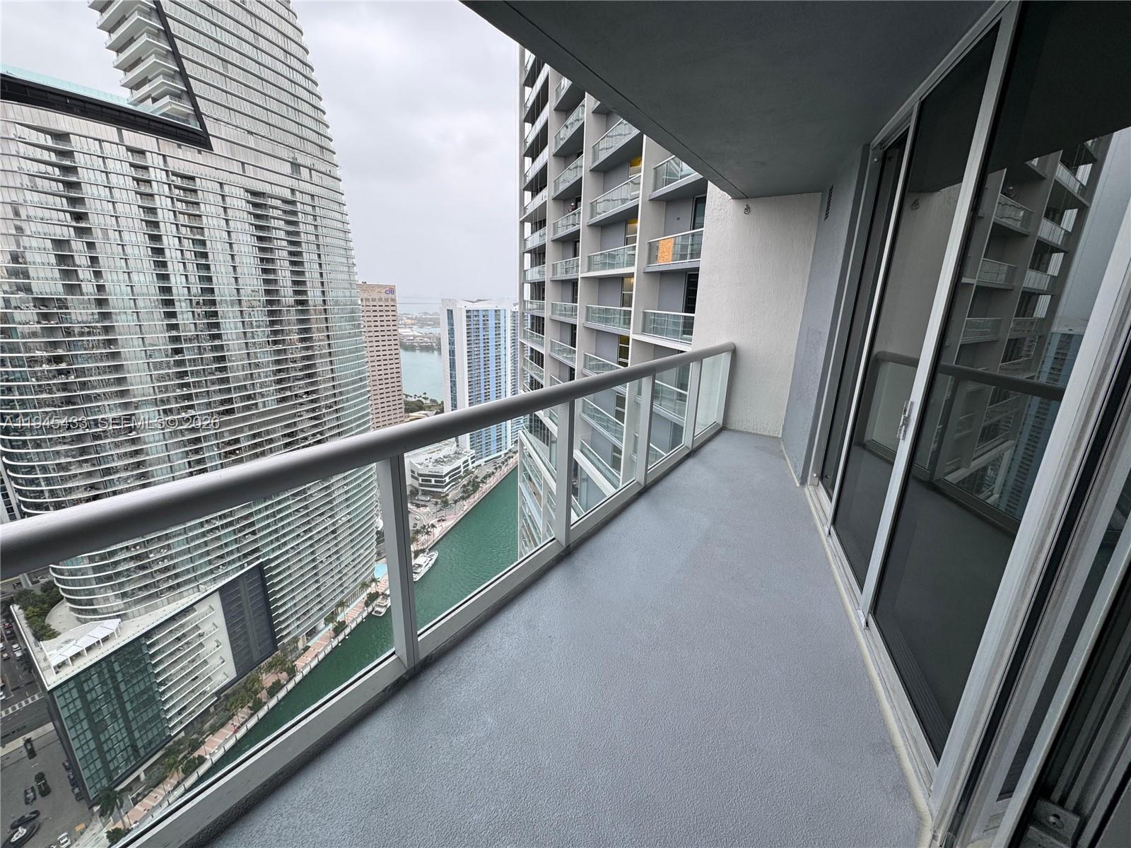 475 Brickell Avenue, Unit 4512 Miami, FL 33131 - Photo 23 of 32 a view of balcony with wooden floor