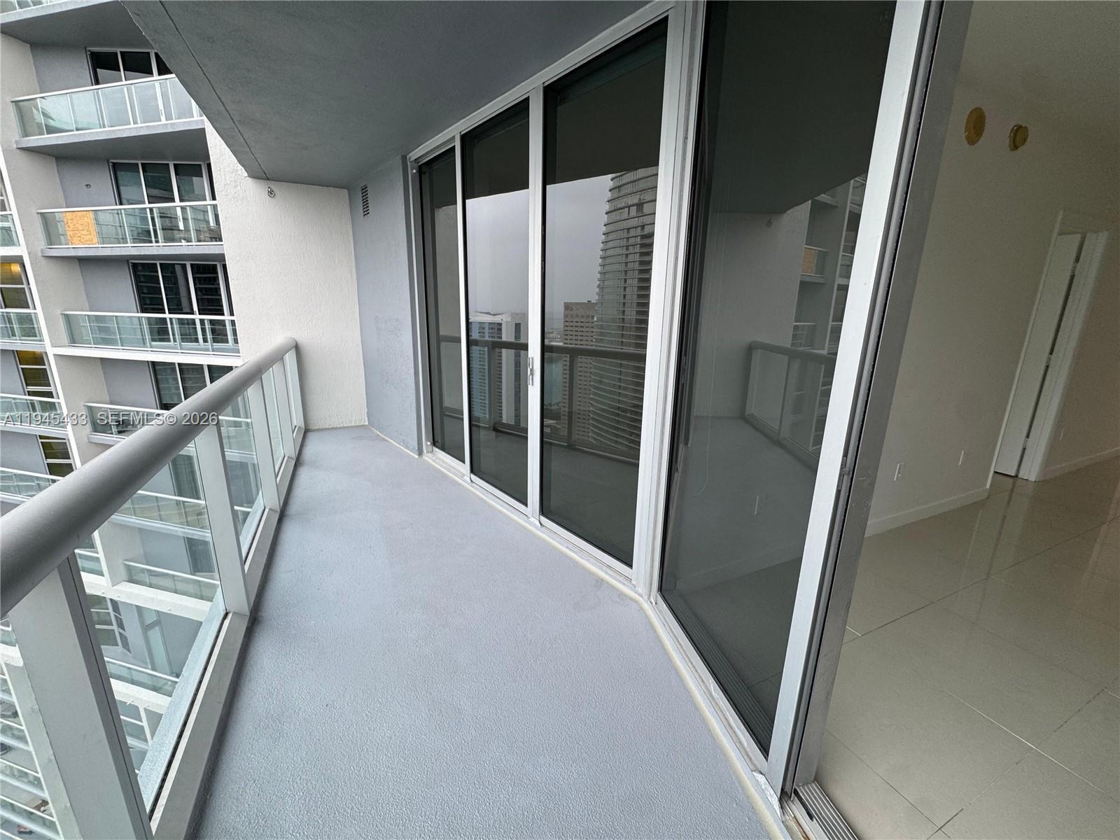 475 Brickell Avenue, Unit 4512 Miami, FL 33131 - Photo 29 of 32 a view of entryway with stairs and wooden floor