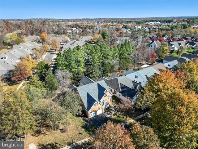 a view of a golf course with a lake view