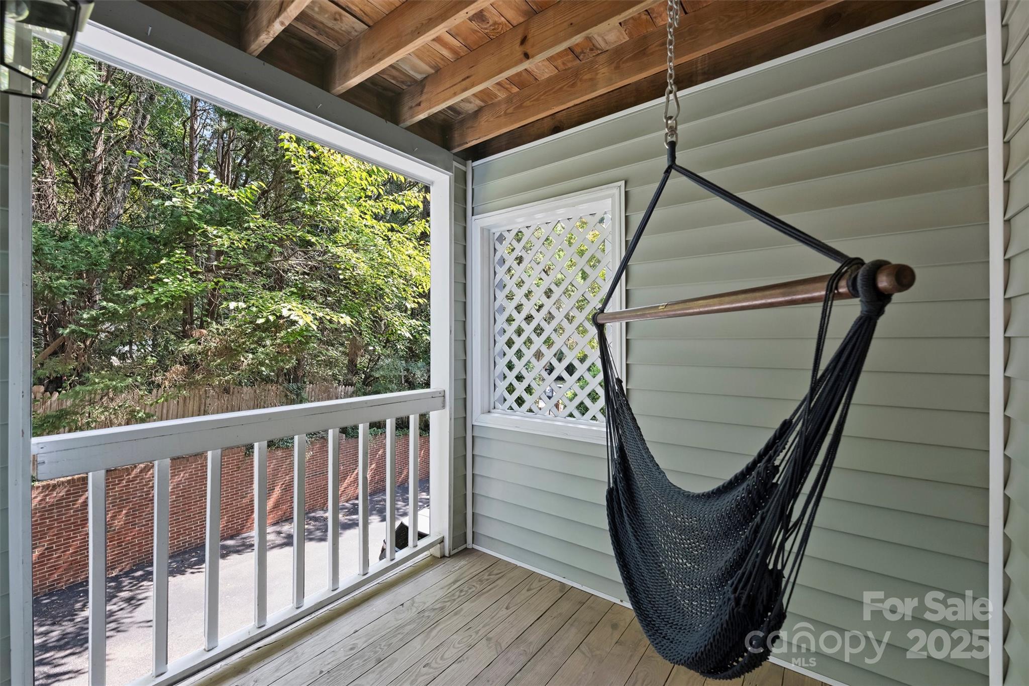 430 Queens Road, Unit 712 Charlotte, NC 28204 - Photo 33 of 43 a view of a balcony with wooden floor