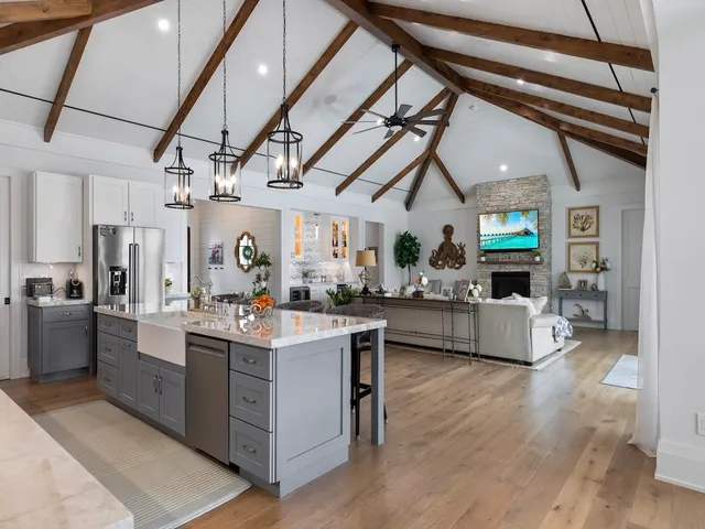 a view of kitchen with cabinets and wooden floor