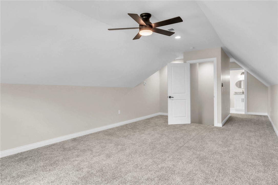 1015 Winmar Drive Anderson, SC 29621 - Photo 28 of 49 This bright loft offers expansive carpeted flooring and a convenient attached bathroom.