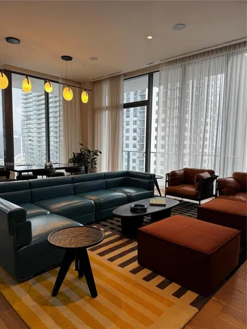 a view of a chairs and table in a patio