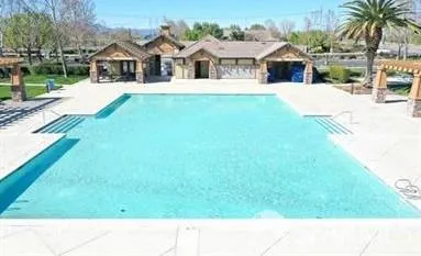 a house view with a outdoor space