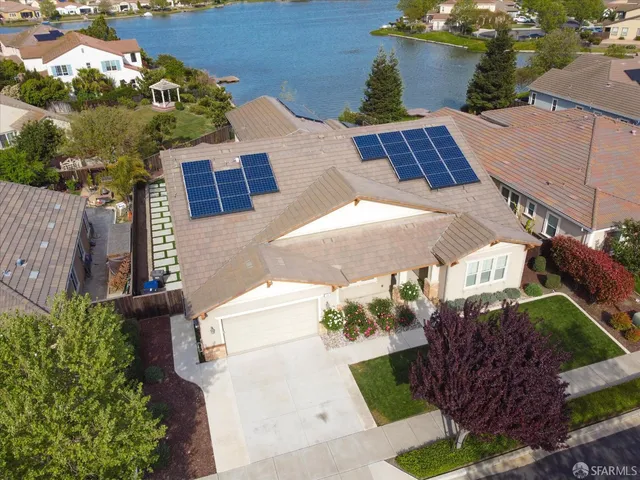 an aerial view of a house with a garden