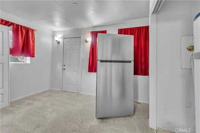 a view of a closet with storage