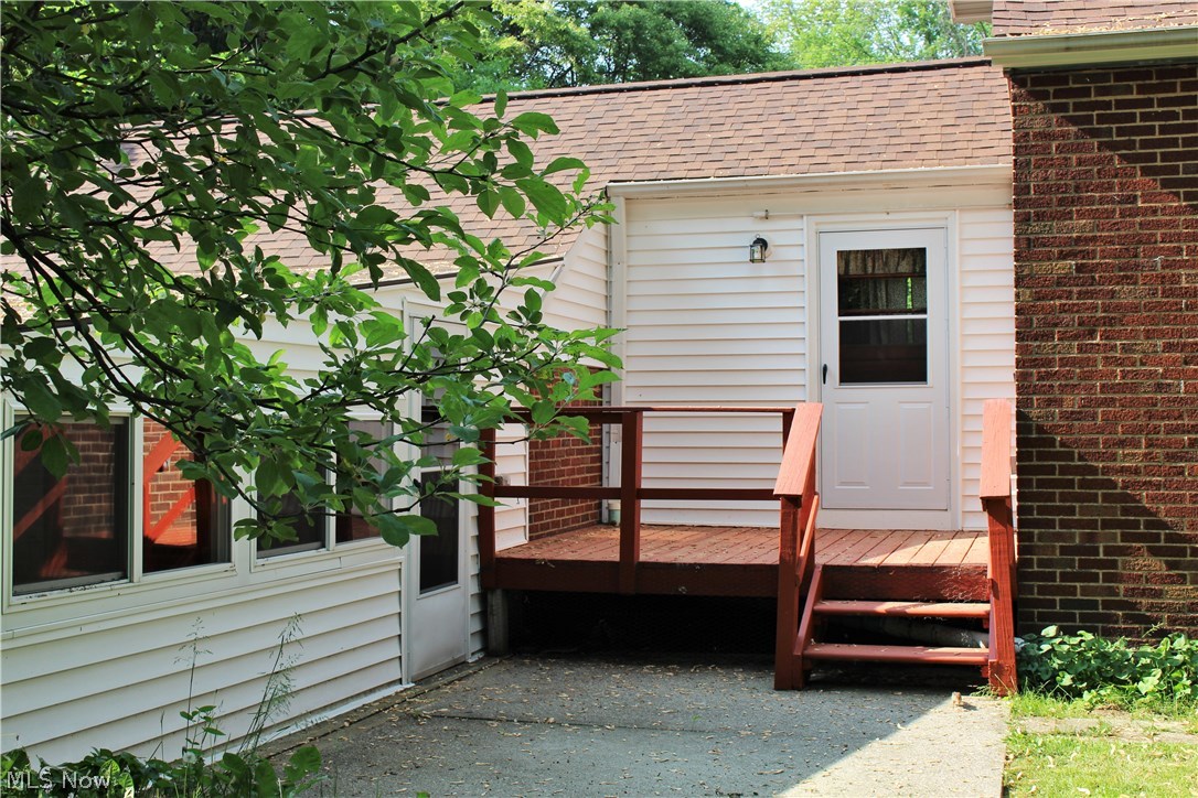 5944 Highland Road Cleveland, OH 44143 - Photo 19 of 20 Deck on back of the house to the fenced in back yard.