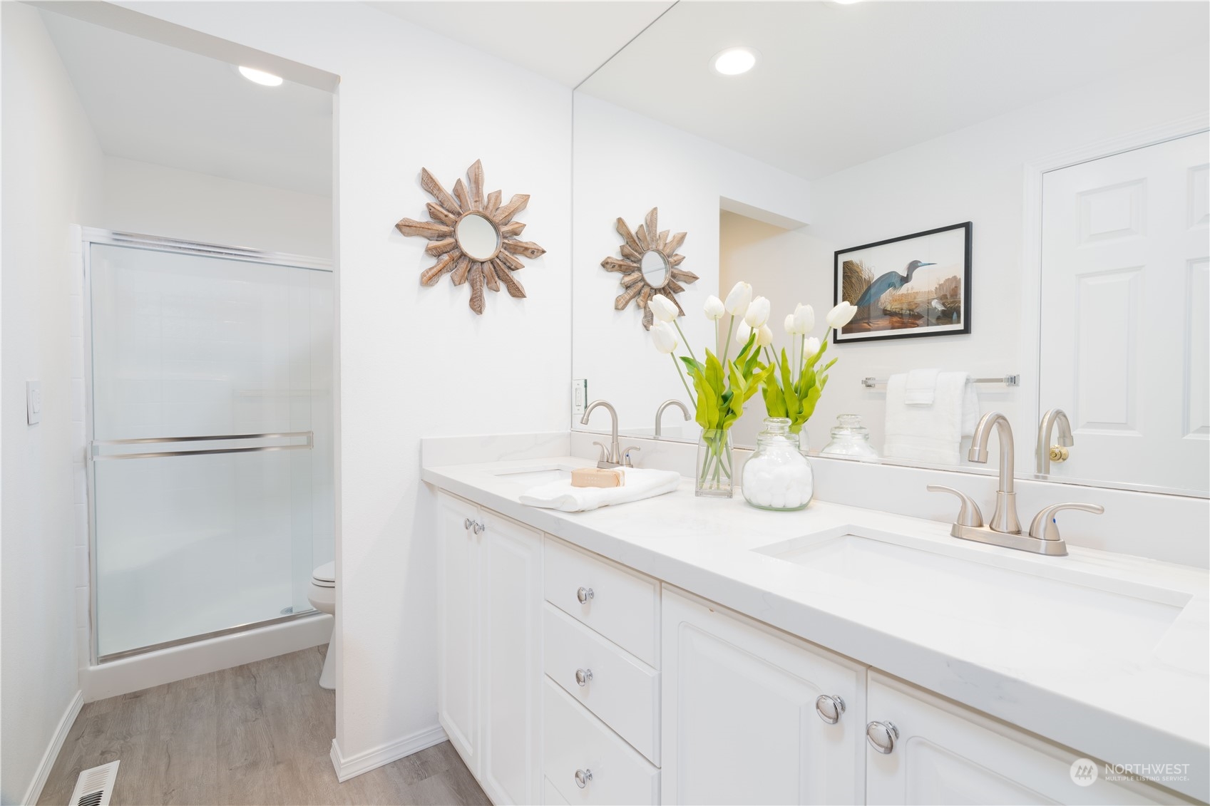3725 Northeast 6th Street Renton, WA 98056 - Photo 11 of 19 a bathroom with a sink a vanity and a mirror