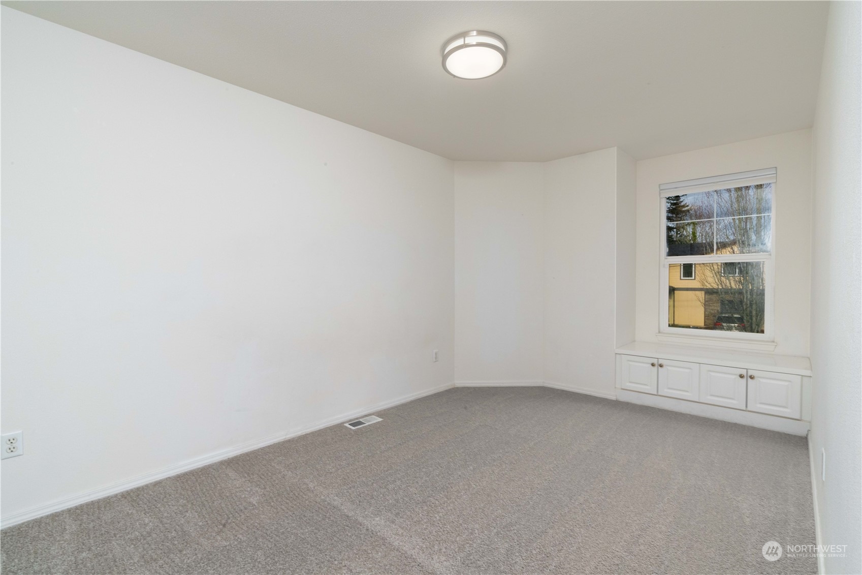 3725 Northeast 6th Street Renton, WA 98056 - Photo 13 of 19 an empty room with windows