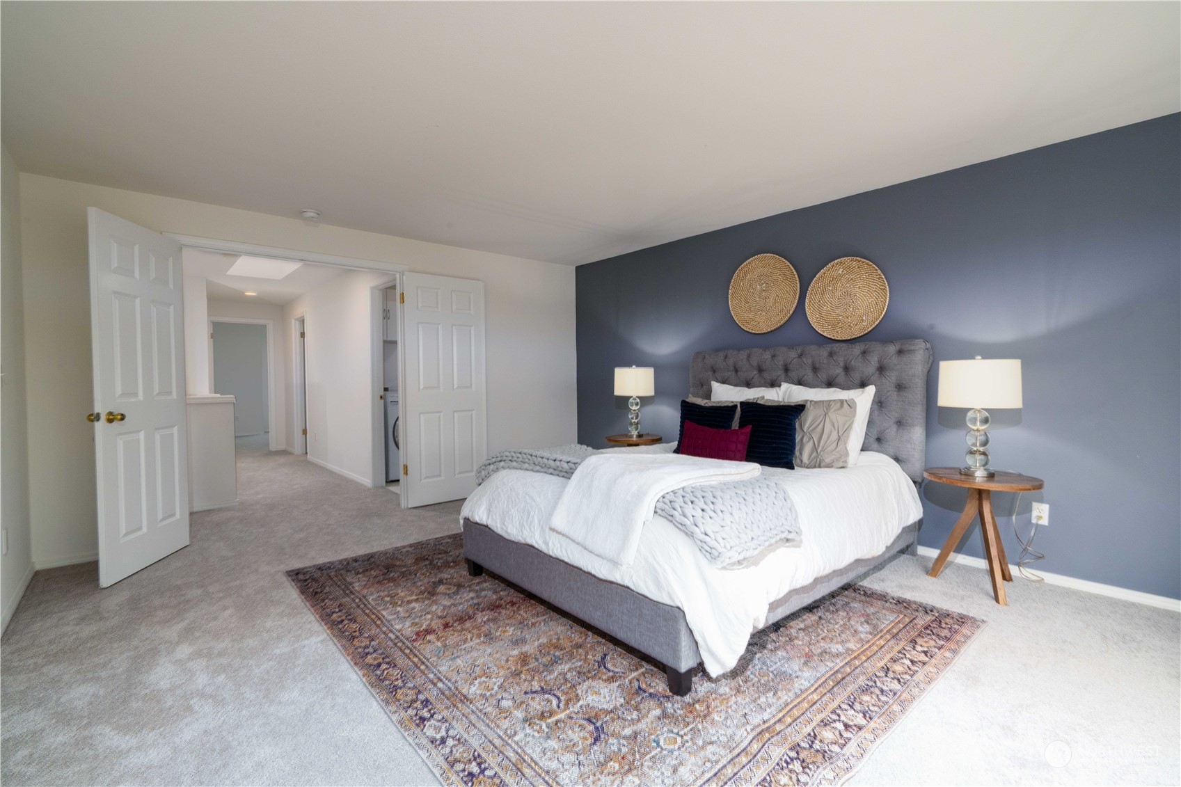 3725 Northeast 6th Street Renton, WA 98056 - Photo 10 of 19 a bedroom with a bed and window